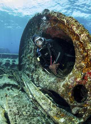 diver-surveys-the-wreckage-of-a-historic-ship