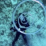 scuba-diver-blows-bubble-rings